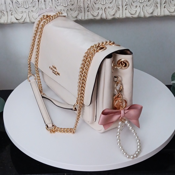 Coach Handbags - NWT Coach Ivory Shoulder Bag with Gold Chain And Pearls And Bow KeyRing